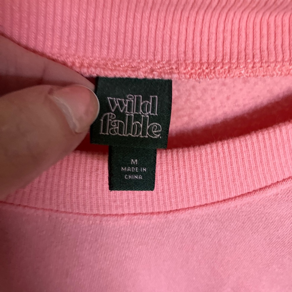 Pink medium sweatshirt, with lg orange block letters, LA.